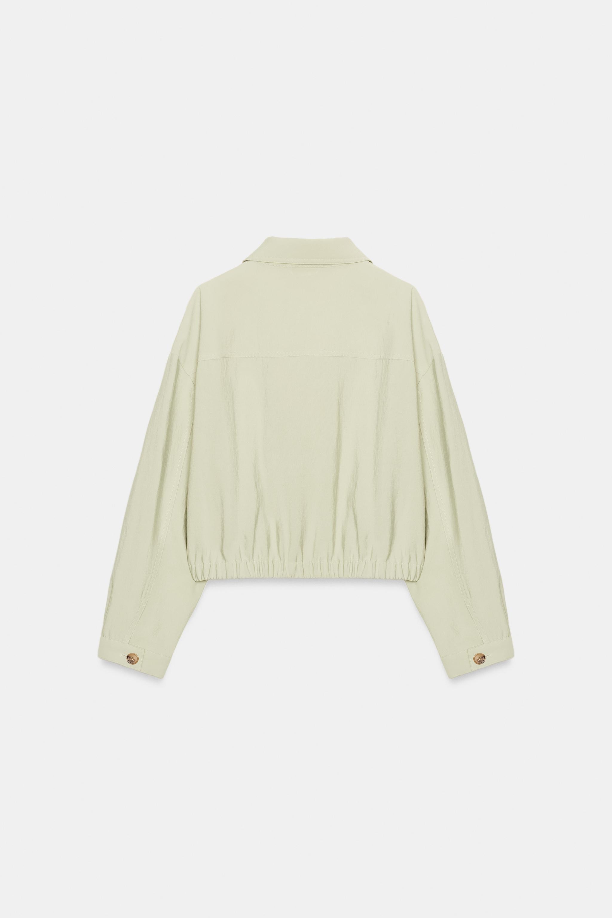 SHORT JACKET WITH FLAP POCKETS